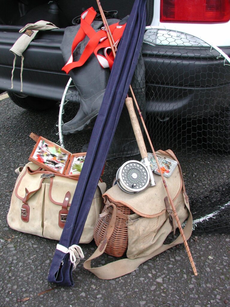 Fishing gear next to a car