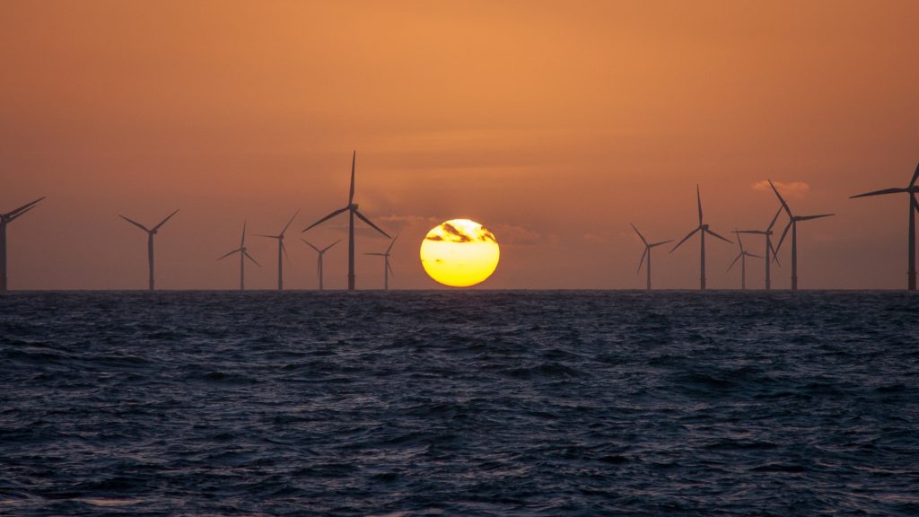 Wind turbines in front of sunset