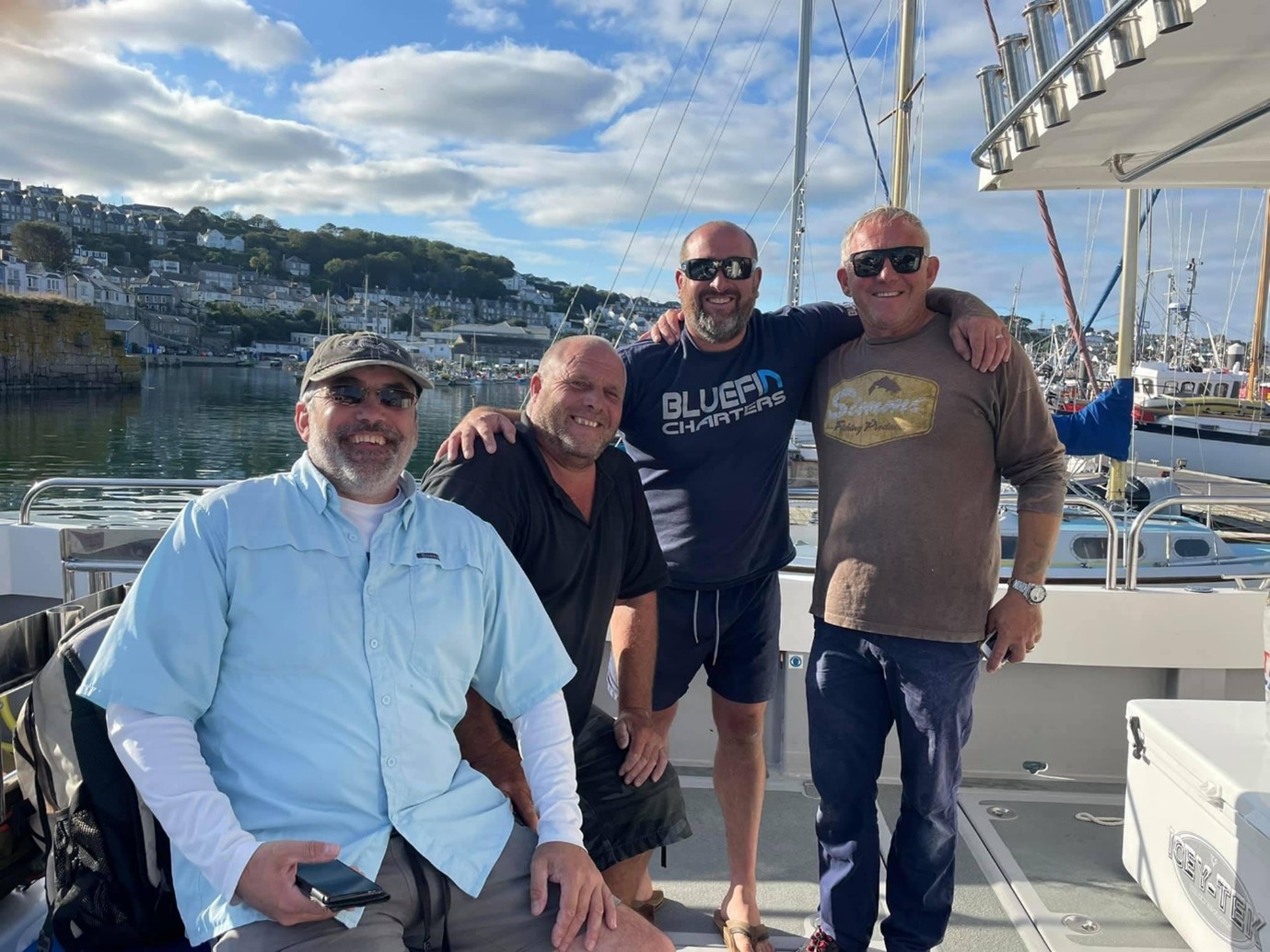 fishermen on a harbourside