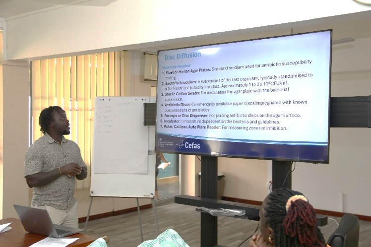 Cefas scientist presenting in Ghana